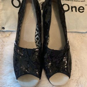 Toms black sequined wedges.